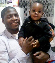 Omar Edwards with his son